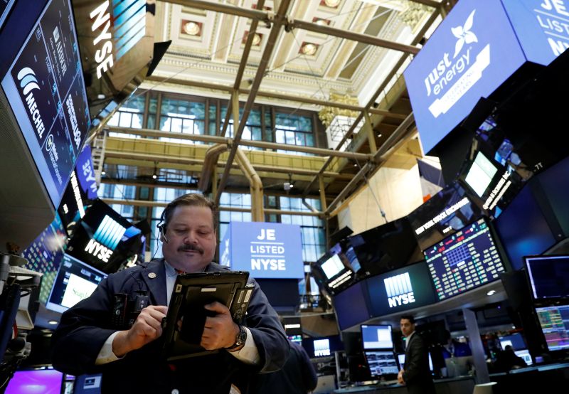 A trader works on the floor of the New York Stock Exchange in New York. u00e2u20acu2022 Reuters pic