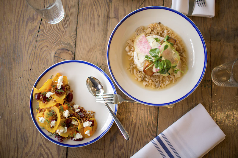 The soy-cured sablefish with rice and shimeji mushroom dashi, and a side of winter squash with pickled cherry, oats, smoked chevre and dill at Royal Dinette in Vancouver  March 20, 2017. — Picture by Jeremy Bittermann/The New York Times