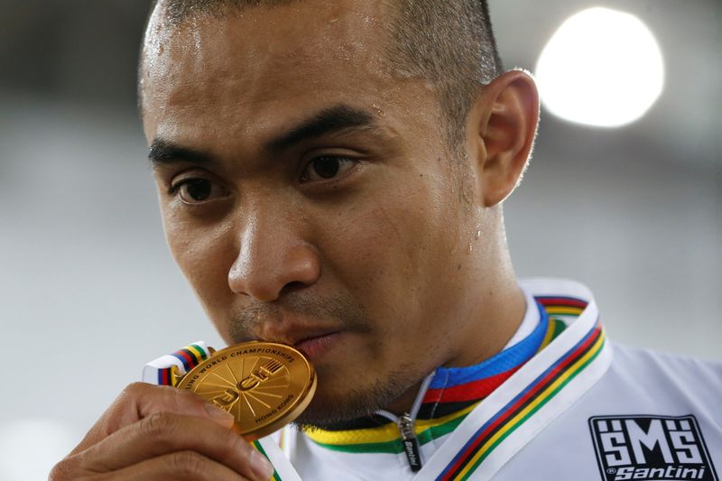 Malaysiau00e2u20acu2122s Mohd Azizulhasni Awang celebrates with gold medal in the Menu00e2u20acu2122s Keirin at the UCI Track World Championships in Hong Kong, April 13, 2017. u00e2u20acu201d Reuters pic