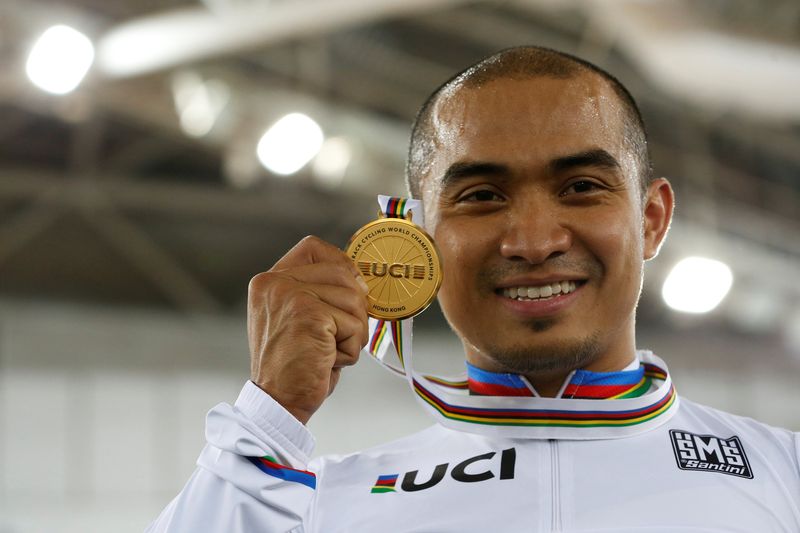 Malaysiau00e2u20acu2122s Mohd Azizulhasni Awang celebrates with gold medal in the Menu00e2u20acu2122s Keirin at the UCI Track World Championships in Hong Kong, April 13, 2017. u00e2u20acu201d Reuters pic