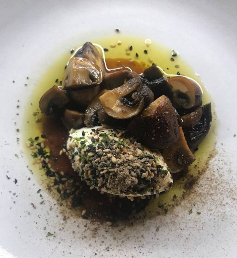 Naughty Piglets, a bar and bistro run by a husband-and-wife team, features wonderful fare like soy pickled mushrooms, served with smoked creme fraiche with seaweed and sesame. — Handout via TODAY