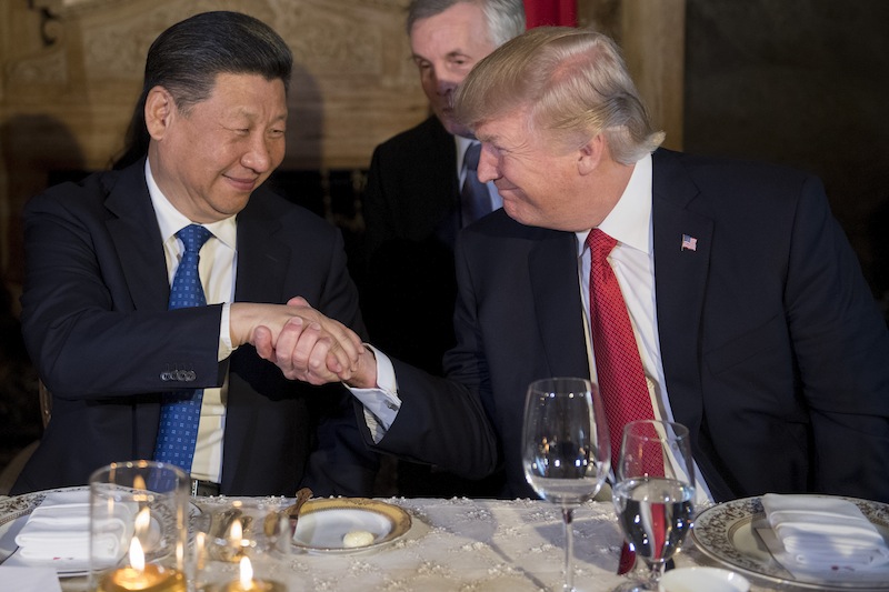 US President Donald Trump and Chinese President Xi Jinping shake hands during dinner at the Mar-a-Lago estate in West Palm Beach, Florida, on April 6, 2017. u00e2u20acu201d AFP pic