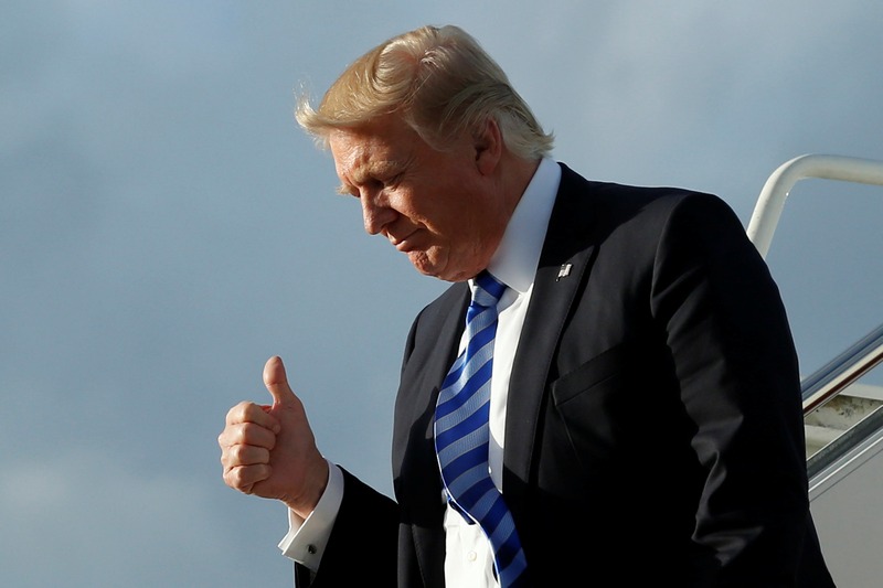 US President Donald Trump gestures as he arrives at Palm Beach International Airport in West Palm Beach, Florida, for the Good Friday holiday and Easter weekend April 13, 2017. u00e2u20acu201d Reuters pic