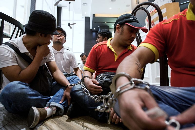 Some foreign nationals without documents being detained during an Immigration Department raid at a shopping centre in Kuala Lumpur, April 28, 2017. u00e2u20acu201d Bernama pic