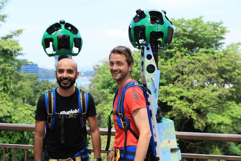 JustRunLah! community members Paviter Singh (left) and Ben Flint don the Street View trekkers at Mount Faber Park April 27, 2017. u00e2u20acu201d TODAY pic