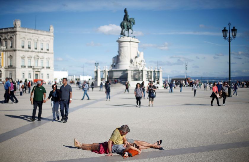 A couple of tourists rest at Comercio square in downtown Lisbon, Portugal April 29, 2017. u00e2u20acu201d Reuters pic