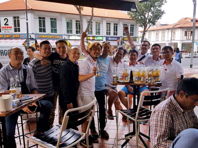 The vibe at neighbourhood bar Mooloolabar, owned by Danny Chua (middle, in blue), is casual. But it is packed with an after-dinner crowd that stays as late as 12am on weekdays. — Handout via TODAY