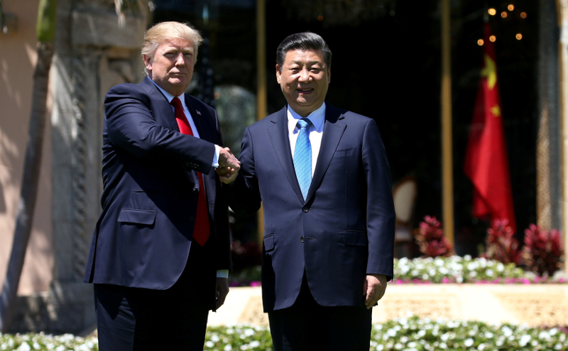 US President Donald Trump (left) and Chinau00e2u20acu2122s President Xi Jinping shake hands while walking at Mar-a-Lago estate after a bilateral meeting in Palm Beach, Florida April 7, 2017. u00e2u20acu201d Reuters pic