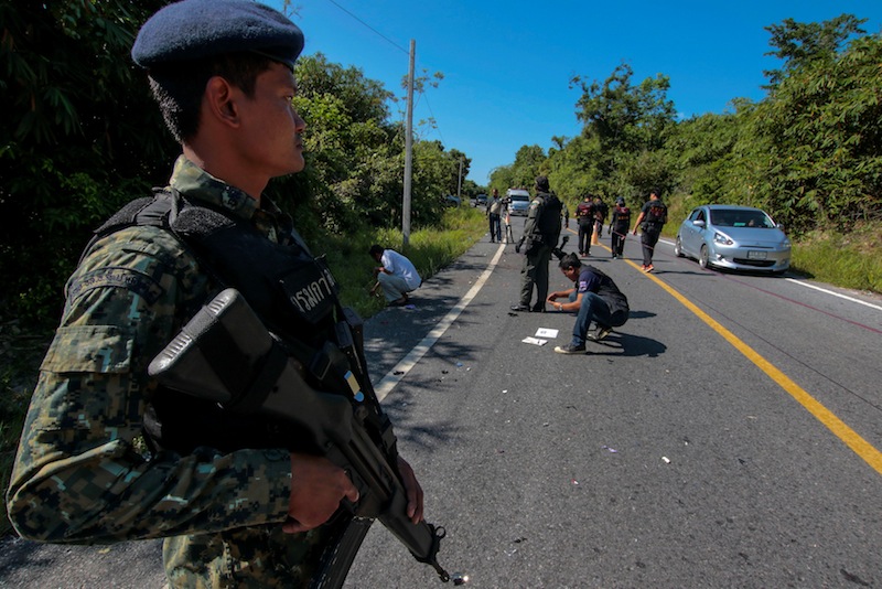Military personnel inspect a site of an attack at the Saba Yoi district, in the troubled southern province of Songkhla, Thailand April 20, 2017. u00e2u20acu201d Reuters pic