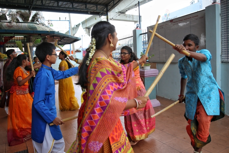 Telugu youths perform during the Ugadhi celebrations at a temple in Puchong last Saturday.