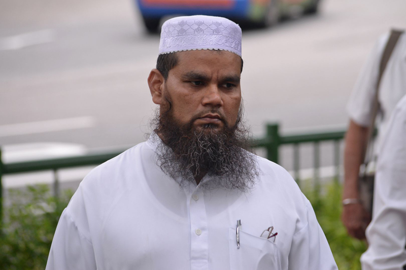 Imam Nalla Mohamed Abdul Jameel, who made allegedly offensive remarks against Jews and Christians, arriving at the State Courts in Singapore April 3, 2017. u00e2u20acu201d Picture by Robin Choo/TODAY