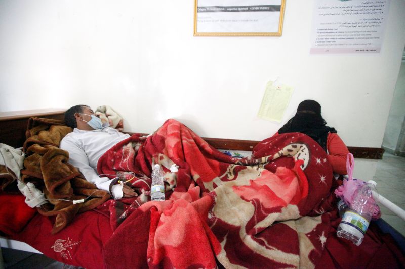 A man and his wife infected with cholera lie on a bed at a hospital in Sanaa, Yemen May 12, 2017. u00e2u20acu201d Reuters pic