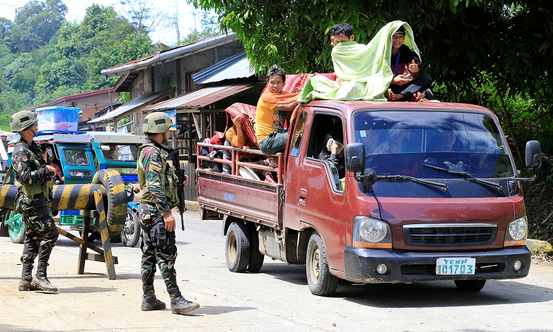 Government troops check a vehicle evacuating residents from their hometown ofu00c2u00a0Marawiu00c2u00a0city in southern Philippines, as it drives past a military checkpoint in Pantar town, Lanao Del Norte, Philippines May 24, 2017.u00c2u00a0u00e2u20acu201d Reuters pic