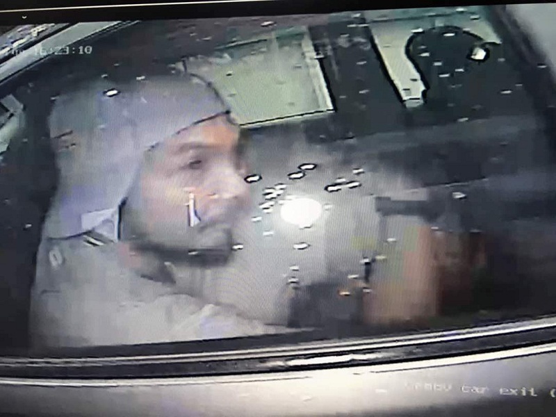 Screenshot of Wisma E&Cu00e2u20acu2122s security footage showing the alleged abductor (wearing a cap). 