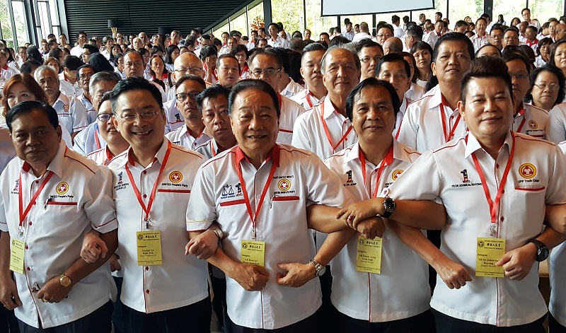 UPP president Datuk Seri Wong Soon Koh (centre, front row) with his deputy Datuk Dr Jerip Susil (second from right) and party secretary general George Lo (second from left) showing their unity at the extraordinary delegates conference in Kuching May 13, 2