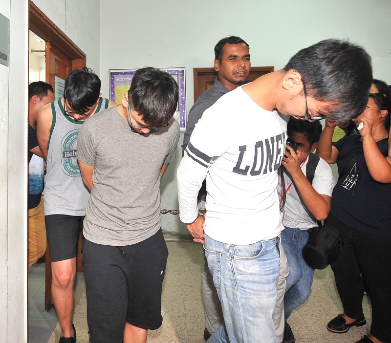 Police arrested JJPTR founder Johnson Lee (second from left) and his two senior aides in Petaling Jaya May 16, 2017. 