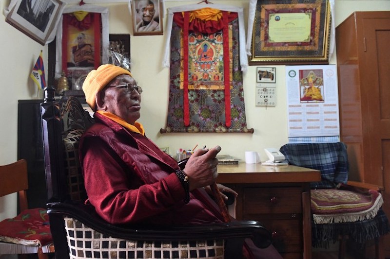In this photograph taken on March 23, 2017, Tibetan medical practitioner Yeshi Dhonden sits inside a room at his Tibetan Herbal Clinic in the Indian town of Dharamsala. u00e2u20acu201d AFP pic