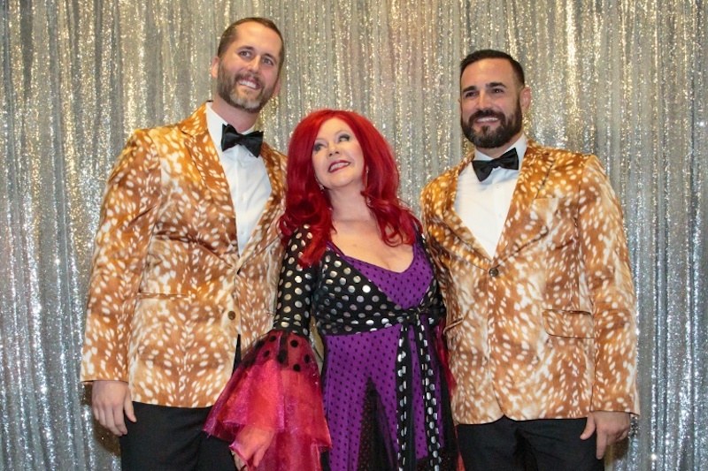 Bernard VandenAvond, Jr (Benny) and Nathan Garcia pose before Kate Pierson, founding member of The B-52u00e2u20acu2122s officiates their wedding at ACL Live in Austin, Texas on May 19, 2017.u00c2u00a0u00e2u20acu201d AFP pic