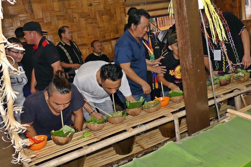 Visitors to the annual Kaamatan Fest at KDCA get to sample local rice wine and traditional food among other things.