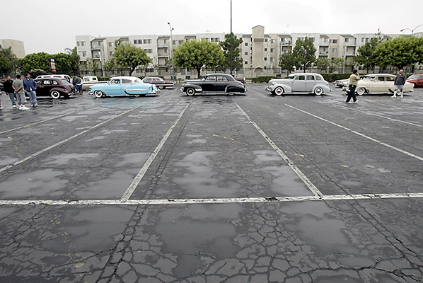 Members of the Old Memories Lowrider Club queue near the entrance of the Los Angeles Sports Arena to register for the Lowrider Experience car show in Los Angeles. u00e2u20acu201d AFP pic