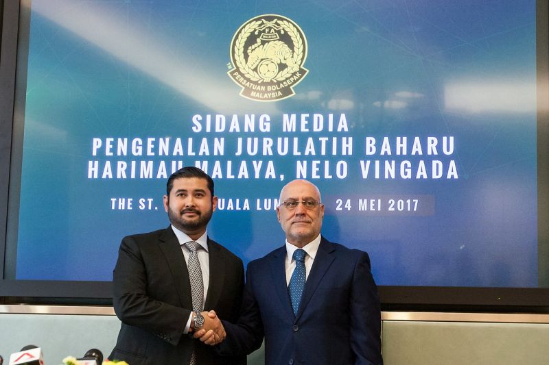 Football Association of Malaysia president Tunku Mahkota Johor Tunku Ismail Sultan Ibrahim shakes hands with new Harimau Malaya coach Nelo Vingada during the latteru00e2u20acu2122s unveiling at a press conference on May 24, 2017. u00e2u20acu201d Bernama pic