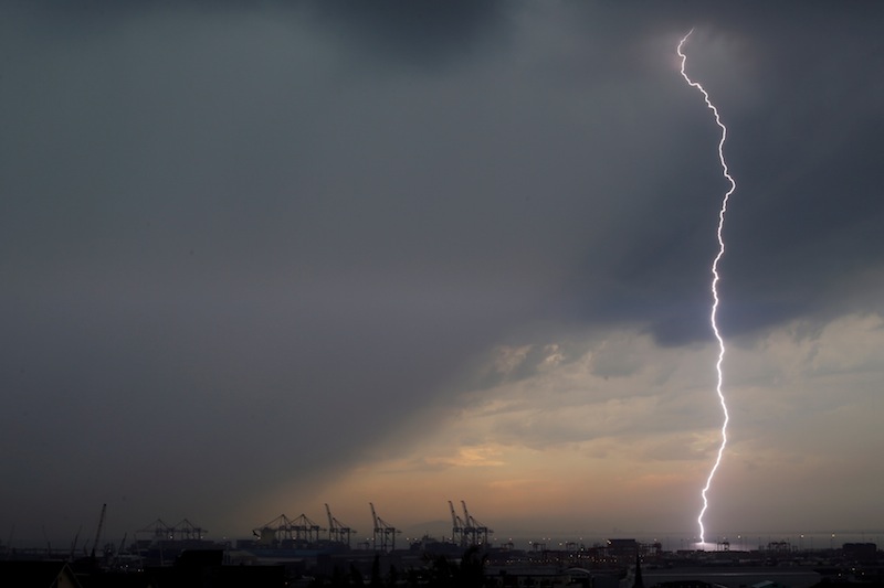 A bolt of lightning strikes over harbour cranes in Cape Town, South Africa, April 26, 2017. u00e2u20acu201d Reuters pic