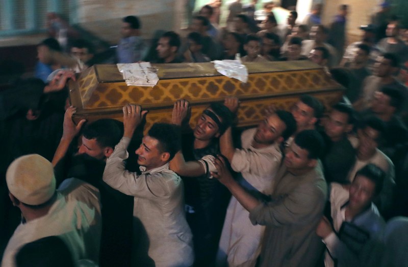 Mourners carry a coffin at the funeral of Coptic Christians who were killed in Minya, Egypt May 26, 2017. u00e2u20acu201d Reuters pic