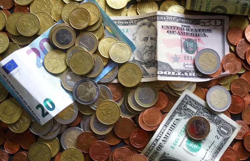 An illustration picture shows euro and US dollar banknotes and coins April 8, 2017. u00e2u20acu201d Reuters pic 