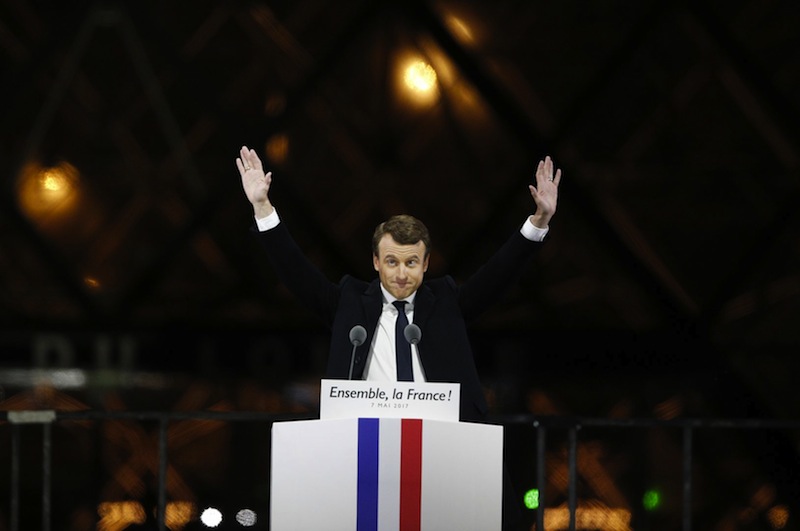 French President-elect Emmanuel Macron gestures during a victory celebration outside the Louvre museum in Paris, May 7, 2017. u00e2u20acu201d AFP pic