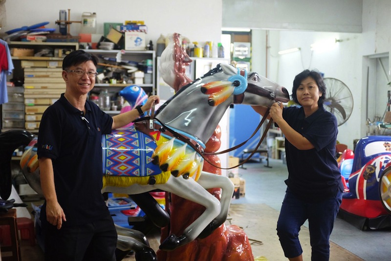Director of Patsfield Services, Robert Chew and his wife Mary Chew, who helps him with the kiddie ride business. u00e2u20acu201d Picture by Toh Ee Ming/TODAY