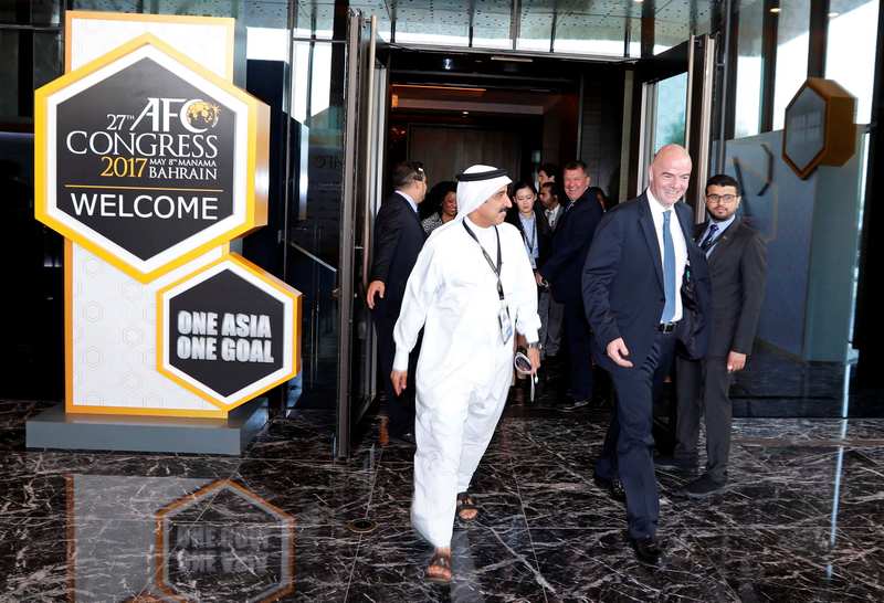 Fifa President Gianni Infantino (centre) leaves after attending the inauguration session of 27th AFC Congress in Manama, Bahrain May 08, 2017. u00e2u20acu201d Reuters pic 
