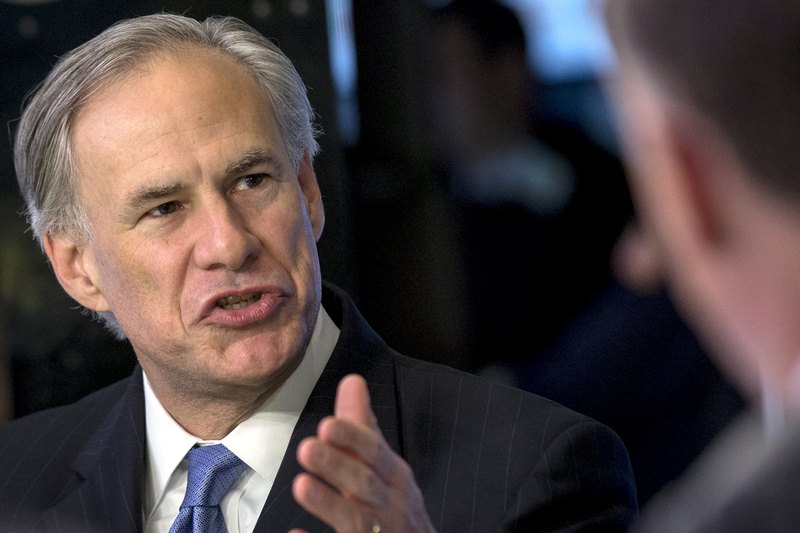 Texas governor Greg Abbott speaks during an interview on the floor of the New York Stock Exchange July 14, 2015.  u00e2u20acu201d Reuters pic