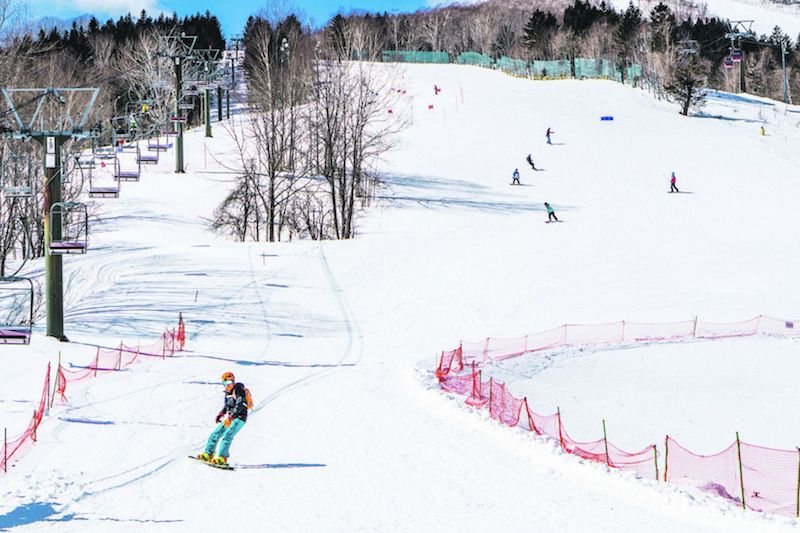 Snowboarders and skiers at Club Med Sahoro Hokkaido. — TODAY pic