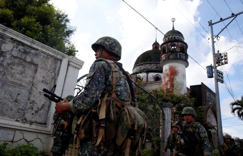 Philippine Marines stand guard outside a mosque in Marawi City in southern Philippines May 30, 2017.  u00e2u20acu201d Reuters pic