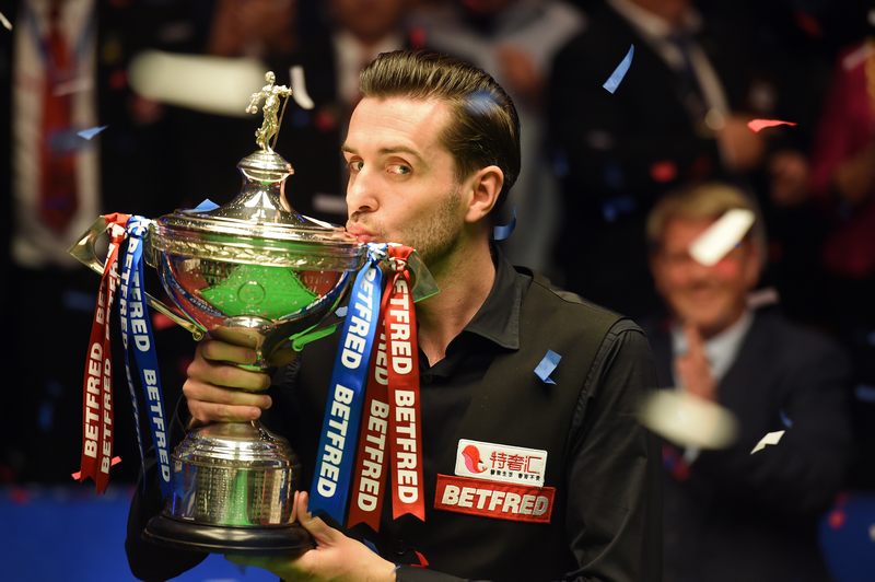 England's Mark Selby kisses the trophy after beating Scotland's John Higgins in the World Championship Snooker final at The Crucible in Sheffield, northern England May 1, 2017. u00e2u20acu201d AFP pic