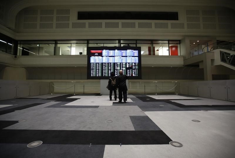 Visitors looks at an electronic board showing the Japan's Nikkei average at the Tokyo Stock Exchange  February 9, 2016. u00e2u20acu201d Reuters pic 