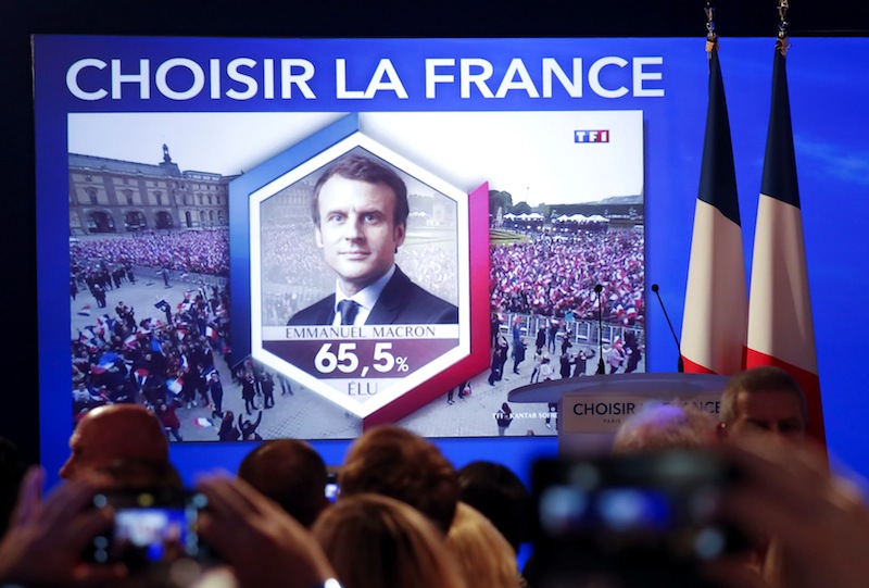Results are projected before Marine Le Pen delivers a concession speech at the Chalet du Lac in the Bois de Vincennes in Paris after the second round of 2017 French presidential election, May 7, 2017. u00e2u20acu201d Reuters pic 