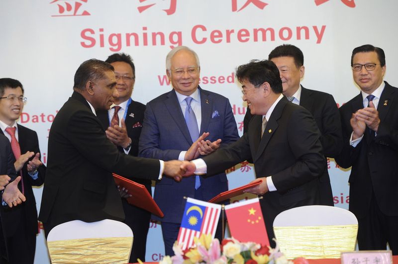 Prime Minister Datuk Seri Najib Razak witnessed the exchange of a memorandum of understanding in Beijing, May 13, 2017, for the second phase of the East Coast Rail Route (ECRL) and the oil and gas pipeline project from Sg Udang to Pengerang. u00e2u20acu201d Bernama p