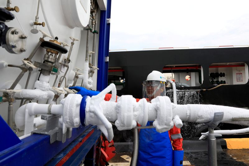 Liquefied natural gas is transferred from an on-shore ISO tank onto a vessel in Singapore in this picture released May 22, 2017. u00e2u20acu201d Reuters pic