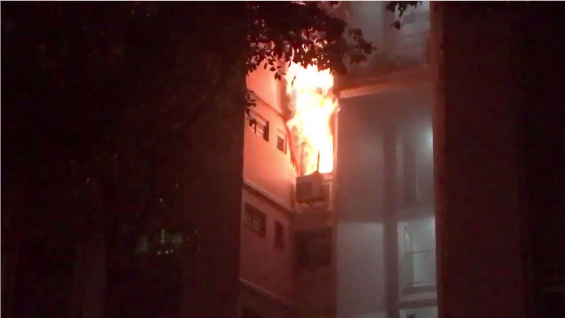 Screenshot taken from video showing a fire that broke out on the 5th floor of a bedroom at 818 Woodlands Street 82. u00e2u20acu201d Picture by @fire_snyper/Twitter