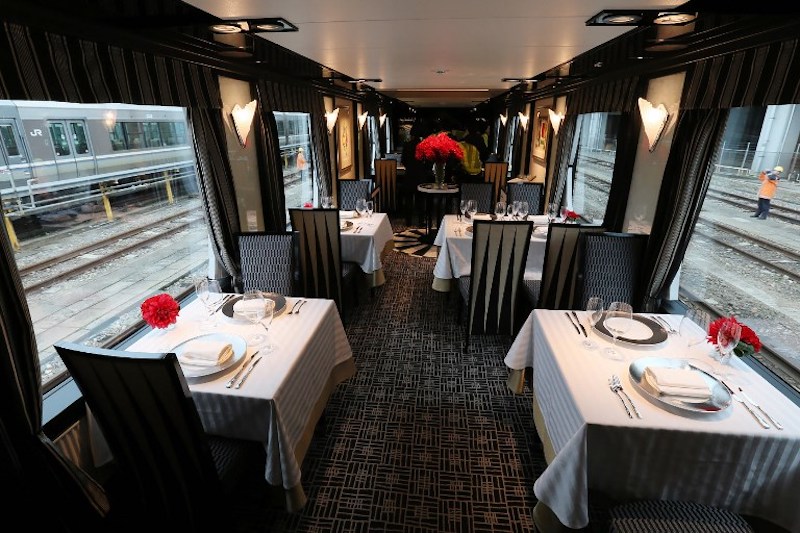 A dining car of Japan’s latest super-deluxe cruise train ‘Twilight Express Mizukaze’ is seen during its press preview in Osaka February 23, 2017. — AFP pic
