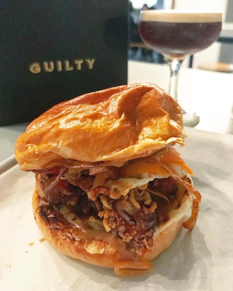The mi-goreng-coated fried chicken burger from Guilty restaurant in Sydney. u00e2u20acu201d Picture courtesy of scheherazadeify/ Instagram