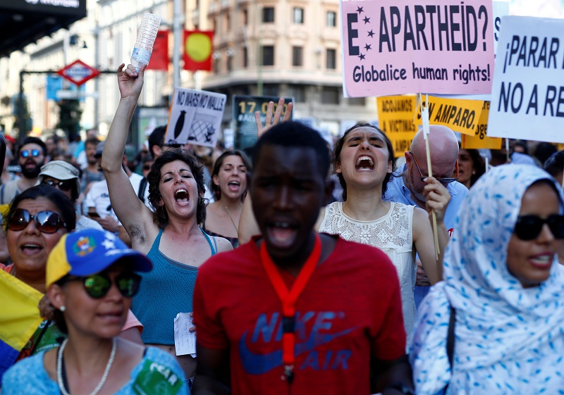 People march during a protest to commemorate the World Refugee Day in Madrid June 17, 2017. u00e2u20acu201d Reuters pic 