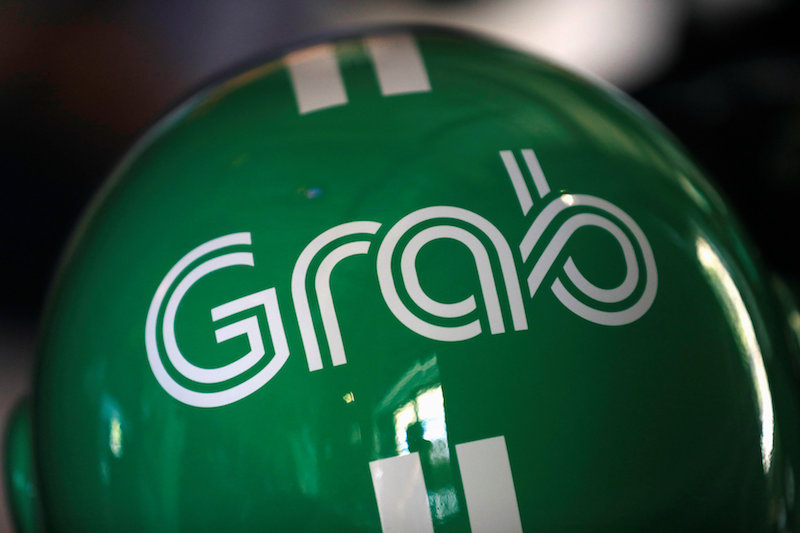 A Grab motorbike helmet is displayed during Grabu00e2u20acu2122s fifth anniversary news conference in Singapore June 6, 2017. u00e2u20acu201d Reuters pic