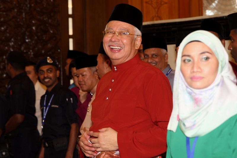 Prime Minister Datuk Seri Najib Razak smiles as he welcomes guests at the Hari Raya open house in Putrajaya June 25, 2017. u00e2u20acu201d Picture by Choo Choy May