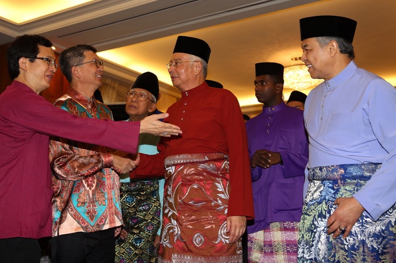 Prime Minister Datuk Seri Najib Razak and Deputy Prime Minister Datuk Seri Ahmad Zahid Hamidi greet guests at the Hari Raya open house at Seri Perdana in Putrajaya June 25, 2017. u00e2u20acu201d Picture by Choo Choy May