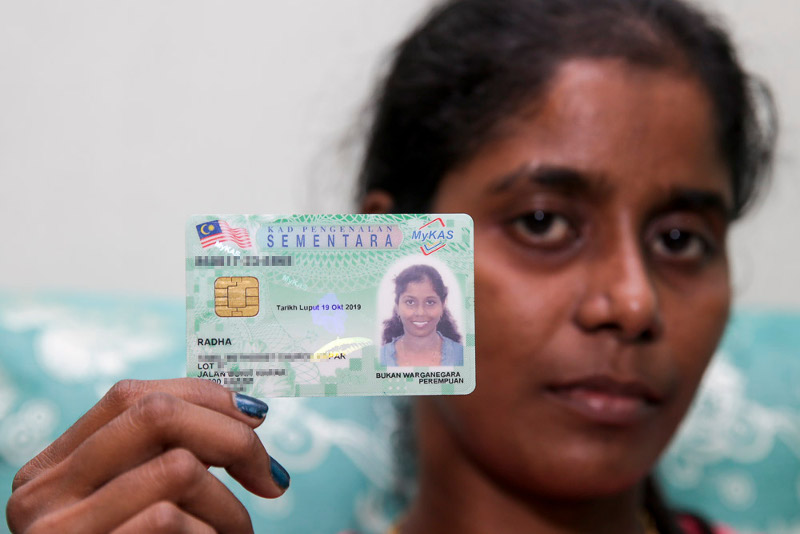 Radha with her MyKad.