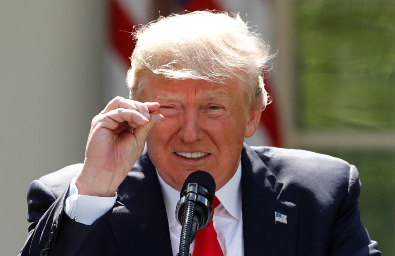 US President Donald Trump refers to amounts of temperature change as he announces his decision that the United States will withdraw from the landmark Paris Climate Agreement, in the Rose Garden of the White House in Washington, US, June 1, 2017. u00e2u20acu201d Reute