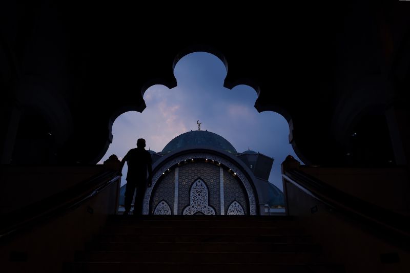 A man arrives at the Wilayah mosque to break his fast and perform prayers during the holy month of Ramadan in Kuala Lumpur on June 11, 2017 u00e2u20acu201d AFP pic