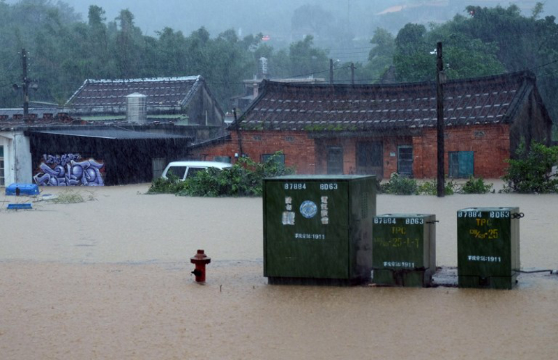 Heavy rain caused flooding in Jinshan, New Taipei City on June 2, 2017. u00e2u20acu201d AFP pic